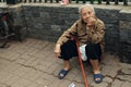 Asian grey_haired woman on the Hanoi Street Royalty Free Stock Photo