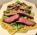 Asian Grilled Flank Steak with Noodles Royalty Free Stock Photo