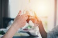 Asian group of friends having party with alcoholic beer drinks and Young people enjoying at a bar toasting cocktails Royalty Free Stock Photo