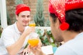 Asian group people drinking at party outdoor.