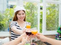 Asian group people drinking at party outdoor.