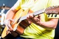 Asian guitarist playing music in recording studio Royalty Free Stock Photo