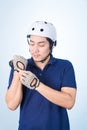 Asian guy with bicycle helmet and gloves Royalty Free Stock Photo