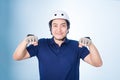 Asian guy gesture biking bicycle, with bicycle helmet and gloves Royalty Free Stock Photo