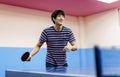 Asian guy playing table tennis Royalty Free Stock Photo