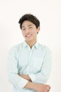 Asian handsome male student with his arms crossed Royalty Free Stock Photo