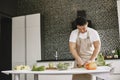 Asian man prepare dinner in a kitchen Royalty Free Stock Photo