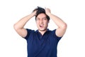 Asian handsome man holding his head frowning with worry. pulling Royalty Free Stock Photo