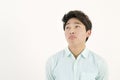 Asian handsome man thinking Royalty Free Stock Photo