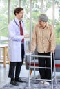 Asian handsome professional successful male doctor white lab coat with stethoscope helping supporting physical therapy senior old Royalty Free Stock Photo