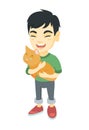 Asian happy boy holding a cat.