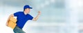 Asian happy delivery man wearing a blue shirt running and carrying paper parcel boxes isolated on blur window of shopping mall Royalty Free Stock Photo