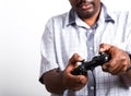 Black man funny use hand playing video game pad joystick Royalty Free Stock Photo