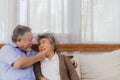 Asian happy retired senior smiling cute eldery couple enjoying & laughing dancing together in home. Romantic relationship of Royalty Free Stock Photo