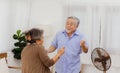 Asian happy retired senior smiling cute eldery couple enjoying & laughing dancing together in home. Romantic relationship of Royalty Free Stock Photo