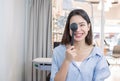 Asian woman doing eyes test in optical lab Royalty Free Stock Photo