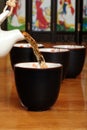 Asian Herb Tea Being Poured Royalty Free Stock Photo