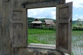 Asian house and water wheel in Southeast Asia. Royalty Free Stock Photo