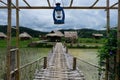 Asian house and water wheel in Southeast Asia. Royalty Free Stock Photo