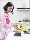 Asian housewife Royalty Free Stock Photo