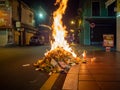 Asian Hungry Ghost day, paper money burning at bone fire, Buddhist and Taoist festival