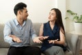 Asian husband explained the mental health problems that occurred to his wife while sitting on the couch at home, Health and Royalty Free Stock Photo