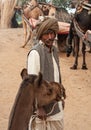 Asian Indian man Camel Driver With Animal