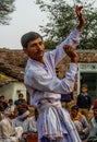 Asian Indian Man Dancer in Costume in Rural Village