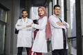 Asian Indian medical team standing outside hospital and looking at the camera Royalty Free Stock Photo