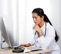 Doctor Nurse in white blue shirt with stethoscope and rubber gloves