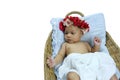 Asian Infant want to sleeping in Wicker baskets isolated on whit Royalty Free Stock Photo