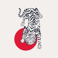 Asian Japanese tiger and red sun.. Wild animal for tattoo or sticker or emblem. Hand drawn engraved sketch. Monochrome