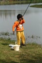 Asian Kid fishing