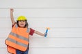 Asian Kid girl wearing reflective shirts and a hat yellow. To learning and enhance development, little architect Royalty Free Stock Photo