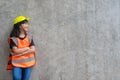 Asian Kid girl wearing reflective shirts and a hat yellow. To learning and enhance development, little architect Royalty Free Stock Photo