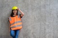 Asian Kid girl wearing reflective shirts and a hat yellow. To learning and enhance development, little architect Royalty Free Stock Photo