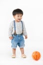 Asian kid playing with toy Royalty Free Stock Photo