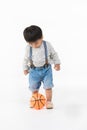 Asian kid playing with toy Royalty Free Stock Photo