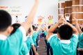 Asian kid stand in the line and exercise at outdoor