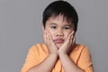 Asian kid very sad Royalty Free Stock Photo