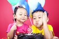 Asian kids celebrating birthday Royalty Free Stock Photo