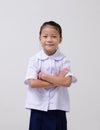 Asian kids cute girl in student's uniform on white background