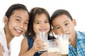 Asian kids with milk Royalty Free Stock Photo