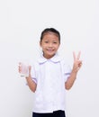 Asian kids - Thai student eat milk on white background Royalty Free Stock Photo