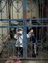 Asian kids wearing masks