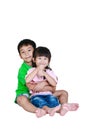 Asian kindly brother hugging his sister smiling happy together, Royalty Free Stock Photo