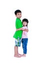 Asian kindly brother hugging his sister smiling happy together, Royalty Free Stock Photo