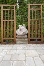 Asian Koi Fish Sculpture in Garden Backyard Royalty Free Stock Photo
