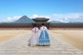 Asian Korean woman dressed Hanbok in traditional dress walking i