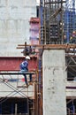 Asian labor people and thai labour worker use machine and heavy machinery working builder railway track electric sky train at